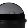 A close-up view of the top part of a black trash can with a translucent gray lid. Náhľad obrázku produktu