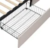 A close-up view of a bed frame with an open storage drawer. Produktbild-Vorschau