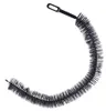 A black radiator cleaning brush with a flexible, curved design and a handle with a loop. Podgląd zdjęcia produktu