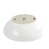 The underside of a white ceramic oval sink with two small holes and a larger central drain hole. Produktbild-Vorschau