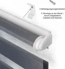 Close-up of a roller blind mechanism with an illustration showing mounting instructions. Voir les images du produit