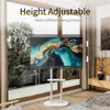 A TV stand with a TV displaying abstract art, placed in a room with large windows and natural light. Anteprima dell’immagine prodotto