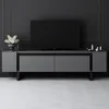 A modern TV stand with a television on top, set against a dark wall. Voir les images du produit