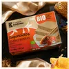 Kandylas Bio Halva mit Honig 400 g Verpackung auf Seidenstoff Produktbild-Vorschau