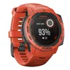A close-up studio shot of an orange Garmin Instinct Solar GPS watch against a white background. Produktbild-Vorschau