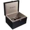 An open black box with a textured interior, containing three car key fobs. Produktbild-Vorschau