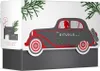 A gift set box designed to look like a vintage car, with pine branches at the top. Produktbild-Vorschau