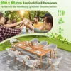 People toasting drinks around a table outdoors, with a table and chairs set up in the foreground. Anteprima dell’immagine prodotto