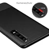 A close-up marketing image of a black carbon fiber textured phone case, showing a detail of the camera protection. Náhľad obrázku produktu