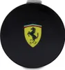 A black circular object with the Ferrari logo in the center. Produktbild-Vorschau