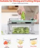 A person is using a vegetable slicer to cut a cucumber, with sliced vegetables in a container below. Three different blade types are shown at the bottom. Produktbild-Vorschau