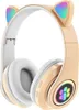 A pair of gold wireless headphones with cat ears and colorful LED lights. Produktbild-Vorschau