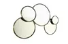 A decorative mirror with multiple circular elements. Podgląd zdjęcia produktu
