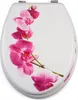 A toilet seat with a pink orchid design. Produktbild-Vorschau