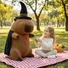 A young girl is having a picnic in a park with a large capybara plush toy. Náhľad obrázku produktu