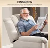An elderly man sits in a recliner chair reading a magazine. Produktbild-Vorschau