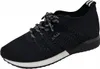 A black sneaker with white laces and a white sole is shown against a white background. Produktbild-Vorschau