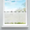 A white sheer cafe curtain with a scalloped bottom edge hangs in a window, obscuring the view of trees and a building outside. Produktbild-Vorschau