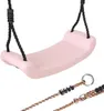 A close-up view of a pastel pink plastic swing seat with black ropes attached. Anteprima dell’immagine prodotto