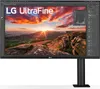 A professional studio shot of an LG UltraFine monitor on a stand, displaying a vibrant landscape image. Produktbild-Vorschau