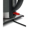 A close-up view of the base of a black and silver electric kettle, showing the power switch and the power cord. Podgląd zdjęcia produktu