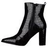 A black, high-heeled, pointed-toe ankle boot with a crocodile-like texture and a side zipper, shown against a white background. Produktbild-Vorschau