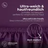 Close-up of a purple fabric with text overlays highlighting product features. Produktbild-Vorschau