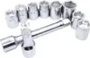 A set of socket wrenches and sockets arranged on a white background. Anteprima dell’immagine prodotto