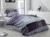 A bedroom scene with a bed dressed in bedding. Produktbild-Vorschau