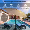 A patio umbrella by a swimming pool with lounge chairs. Voir les images du produit