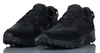 A pair of black Nike Waffle Debut sneakers. Náhled obrázku produktu