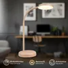 A desk lamp is shown in a home office setting, with text overlays describing its features. Produktbild-Vorschau
