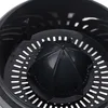 A close-up view of the juicing cone and strainer of a black citrus juicer. Produktbild-Vorschau