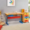 A child's desk and storage unit in a room. Produktbild-Vorschau
