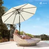 A woman relaxing on a lounge chair under a large umbrella on a patio next to a pool. Produktbild-Vorschau