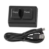 A black programmable keyboard with two keys labeled 'Copy' and 'Paste', along with a USB-C cable. Náhľad obrázku produktu