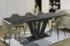 A dining table with chairs in a modern room setting. Anteprima dell’immagine prodotto