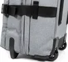 Close-up view of the bottom section of a gray rolling suitcase, showing the wheels and a black strap. Anteprima dell’immagine prodotto