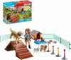 A Playmobil dog training set with figures and accessories. Produktbild-Vorschau