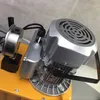 Close-up view of an electric hydraulic pump motor and gauge. Podgląd zdjęcia produktu