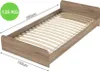 A single bed frame with a slatted base, shown from a diagonal angle against a white background. Produktbild-Vorschau