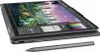 A 2-in-1 laptop with a stylus in front of it, displaying a digital art application on its screen. Produktbild-Vorschau