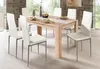 A dining table and chairs set in a dining room. Produktbild-Vorschau