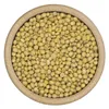 A top-down view of soybeans in a wooden bowl. Voir les images du produit
