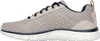 Side view of a beige athletic shoe. Voir les images du produit