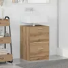 A bathroom sink cabinet with a white sink and a wooden cabinet with two drawers. Produktbild-Vorschau