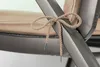 Close-up of a tie on a cushion for a garden chair. Produktbild-Vorschau