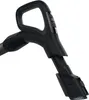 A close-up shot of a black vacuum cleaner handle with integrated controls and a brush attachment. Produktbild-Vorschau