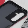 A close-up view of the inside of a red and black phone case. Produktbild-Vorschau