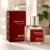 A perfume bottle and its box are displayed on a white surface with soft lighting. Anteprima dell’immagine prodotto